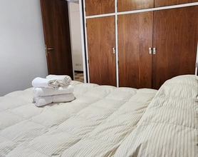 Pileta exterior con terraza