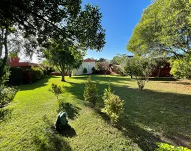 Pileta exterior con terraza
